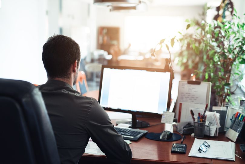 Businessman working on a computer in an office