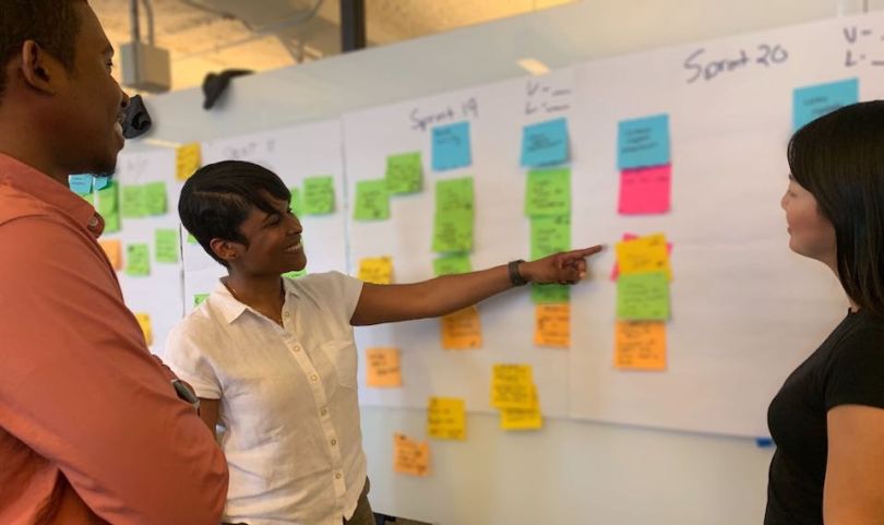 Venmo team working at whiteboard