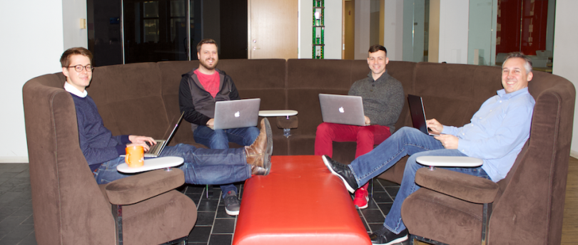 Engineers at Vibes on a circular couch