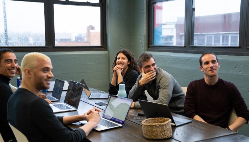 Waldo team members in an engaging meeting. 