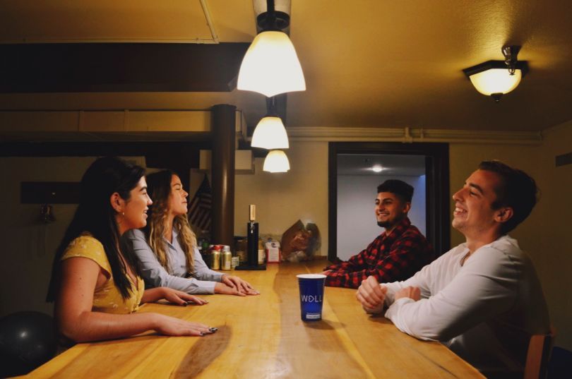 coworkers chatting at a table