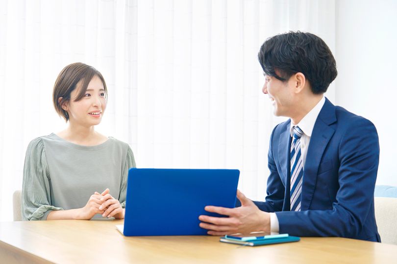 Salesperson talking to a client