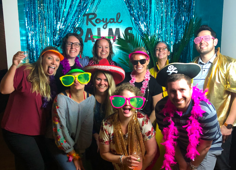Yello team at tropical-themed party