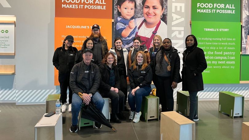 Zumper team members volunteering at a food bank. 