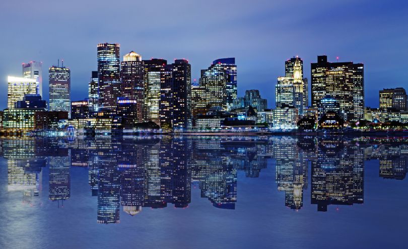 The Boston skyline is pictured at nighttime.