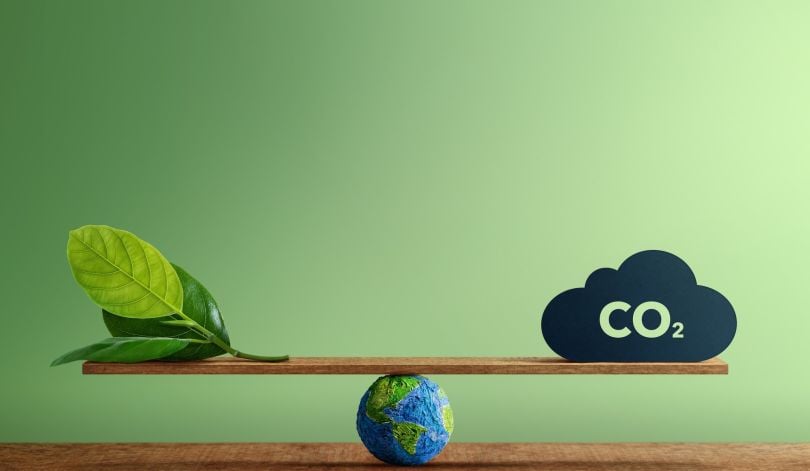 A scale depicting carbon neutrality is pictured.