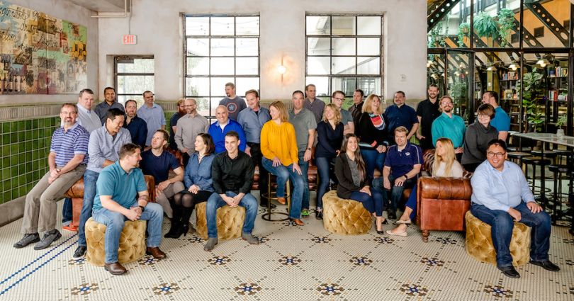 Cerity team in group photo