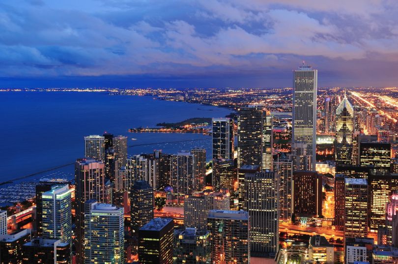 The Chicago skyline is pictured at night.