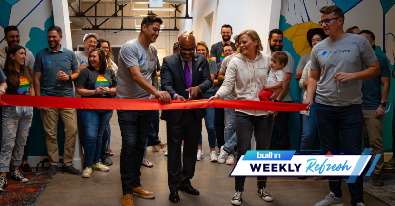 Denver Mayor Michael Hancock attends a ribbon-cutting ceremony at AgentSync’s new office in Denver.