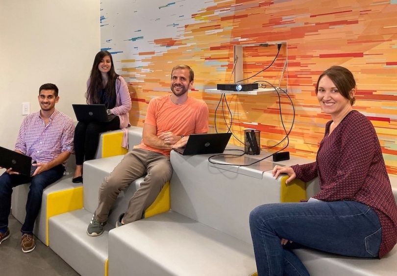 Conversant team members smiling