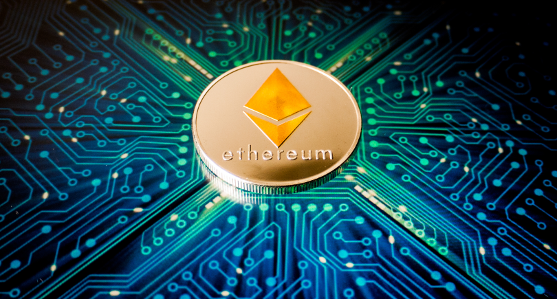 One Ethereum coin on a background of blue circuit board pattern