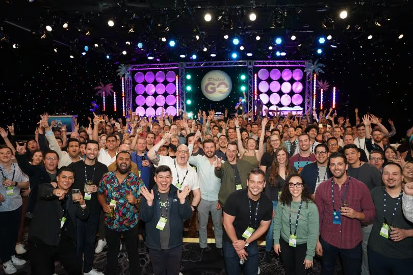 FloQast employees celebrate at an event.&nbsp;