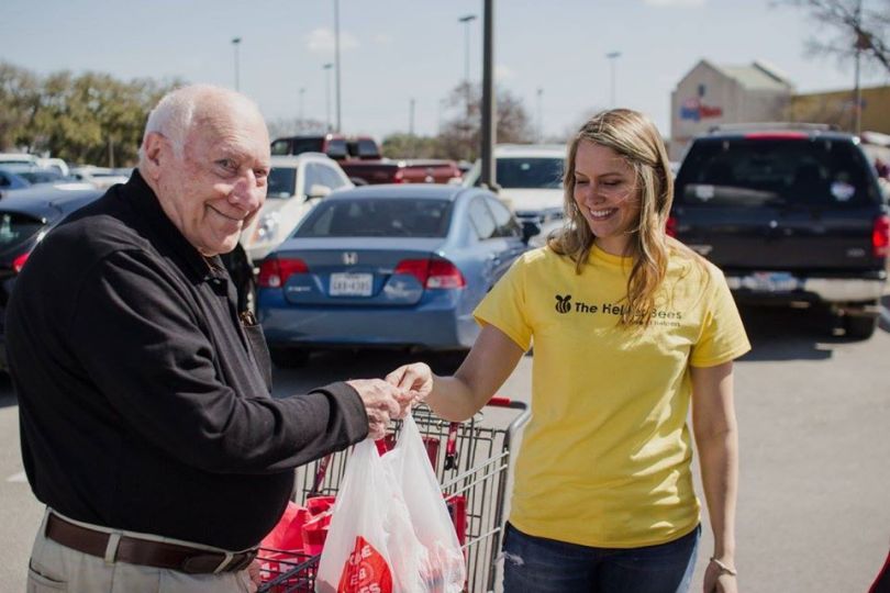 Helper Bee caregiver with senior man