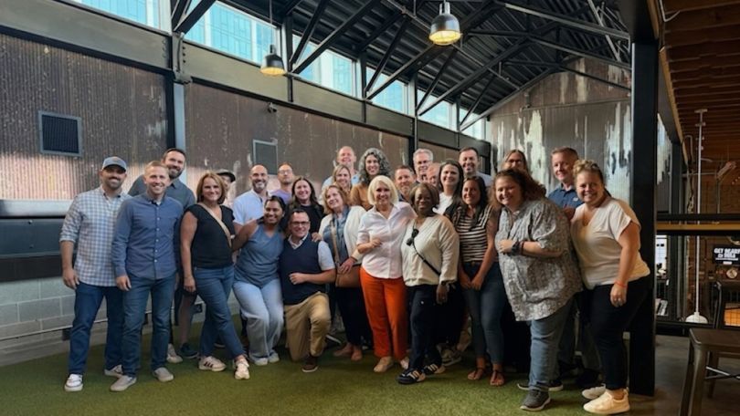 A group photo of Openly employees