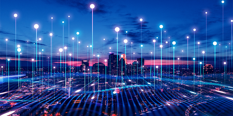 Data points rising from a cityscape.