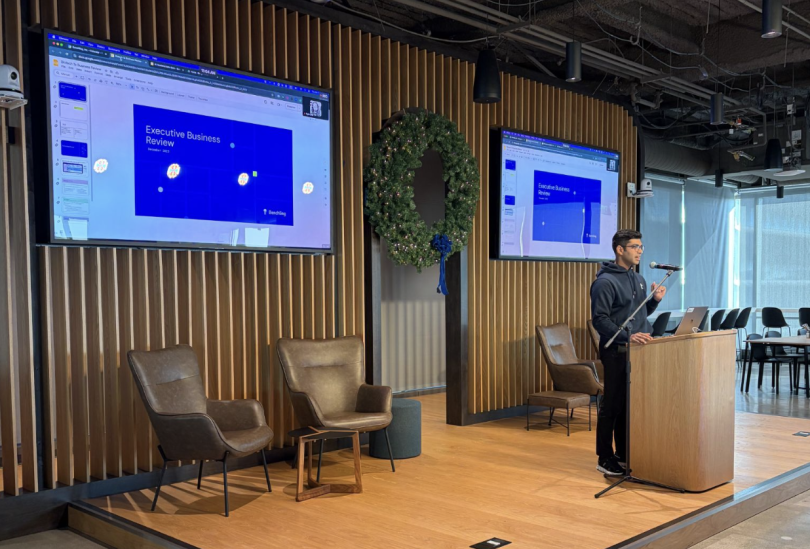 A Benchling team member presents onstage during AI Week
