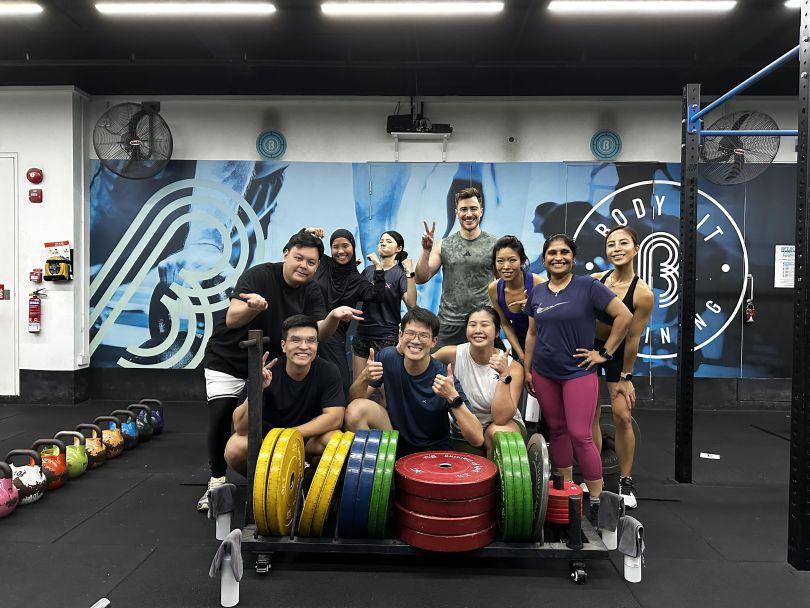 Braze team members pose for a photo while taking part in a fitness class