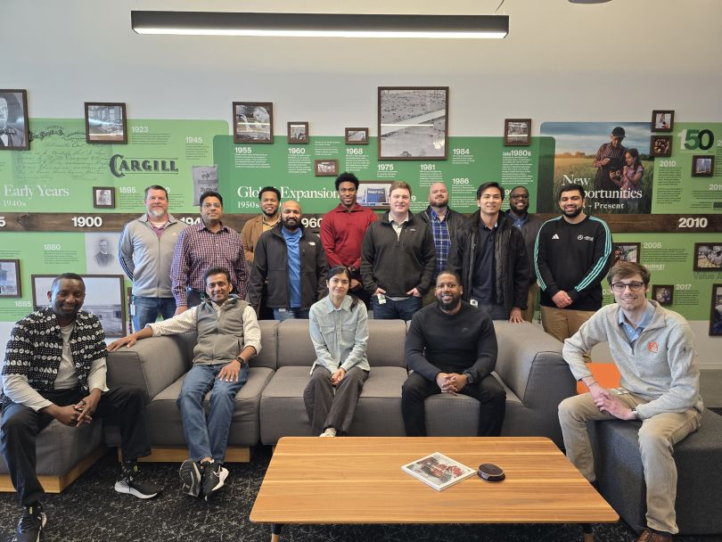 Cargill team members posing for a group photo in the company’s office