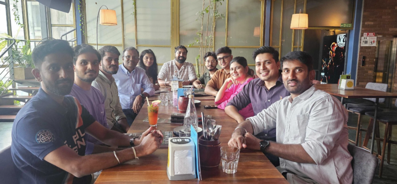 GitLab team members having dinner together at a restaurant. 