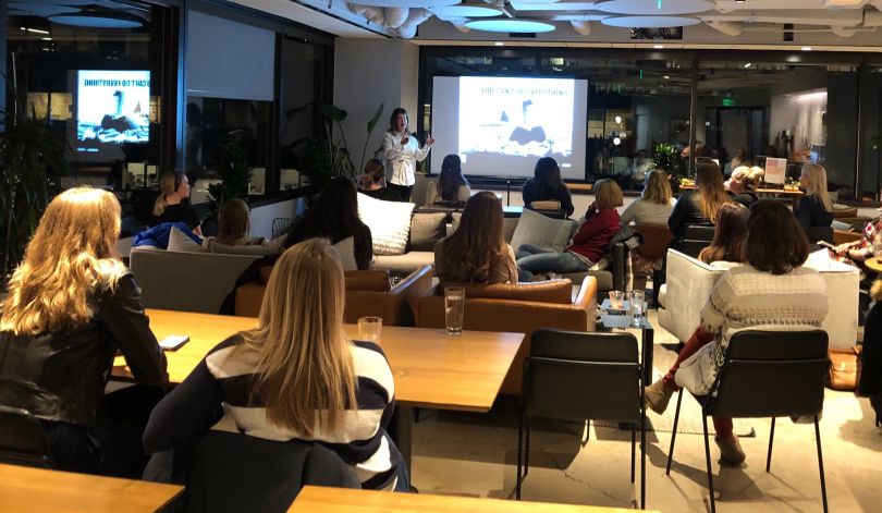Team members attend an ERG event at DailyPay