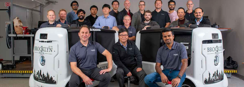 The Magna International team with their autonomous pizza delivery robots