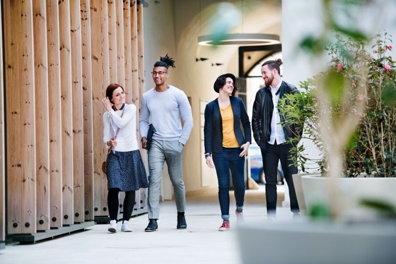 dallas tech hub coworkers walking outside