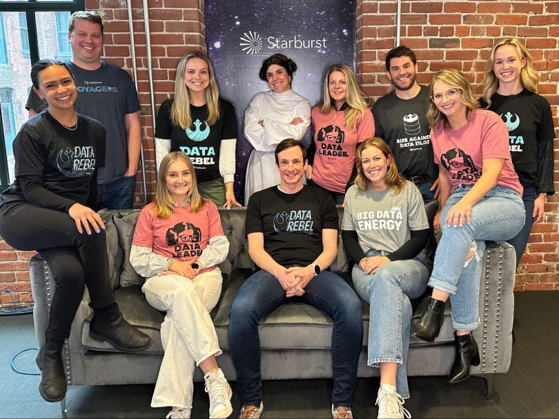 Starburst team members on a couch at the company’s headquarters