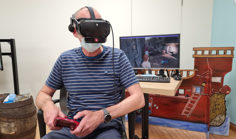A person experiencing the mayflower through smell integrated vr.