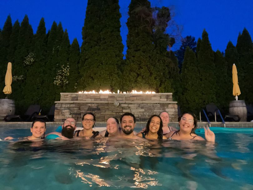 Roofr employees taking a swim during the company’s summer off-site gathering.&nbsp;