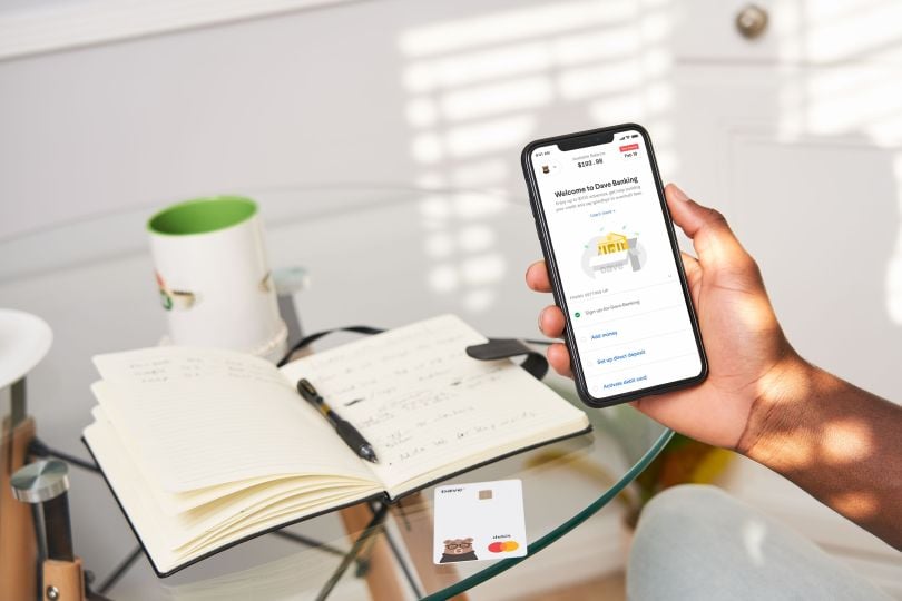 man using Dave mobile banking app