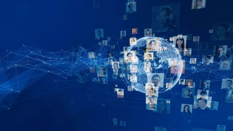 A network of connected profiles of diverse people surrounding a digitized globe, representing global communication and social networking.
