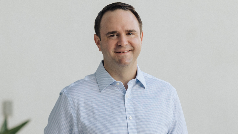 Sam Holliday, Oshi Health CEO, poses for a photo.