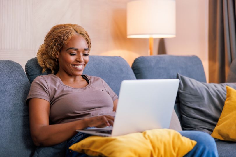 person typing at computer
