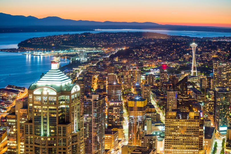 A photo of the Seattle skyline is shown.