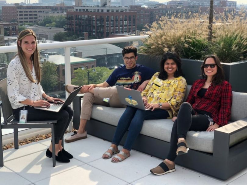 ServiceNow team working on rooftop