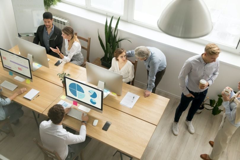 office scene people working and talking