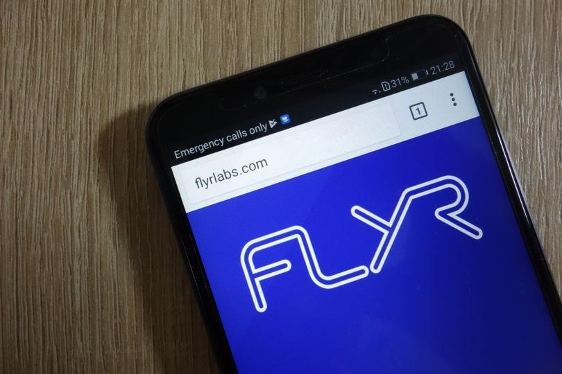 A smartphone viewing the Flyr Labs website