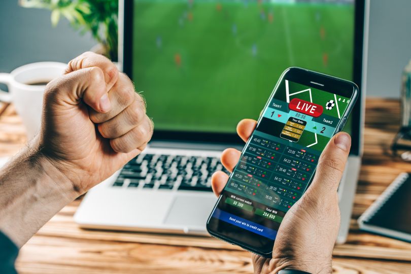 Person celebrates winning bet