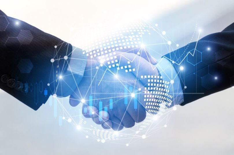 An image is pictured depicting a tech partnership.