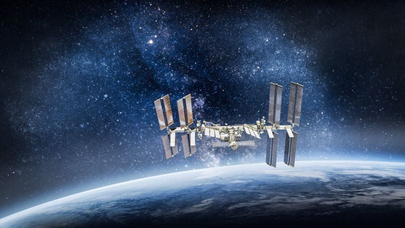 The International Space Station orbiting around Earth.