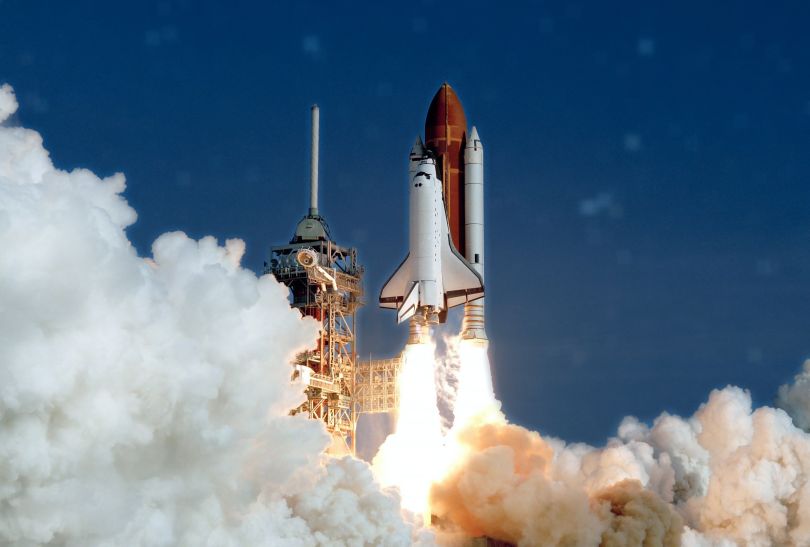 A space rocket mid-launch.