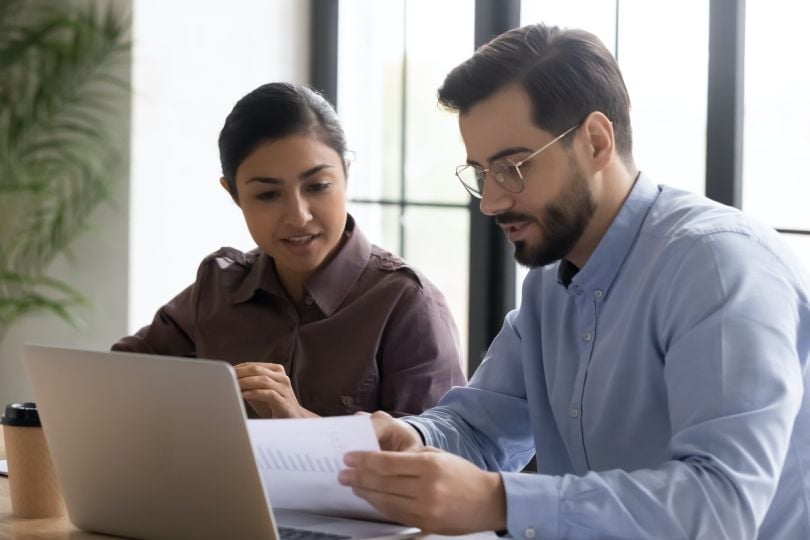two coworkers working together