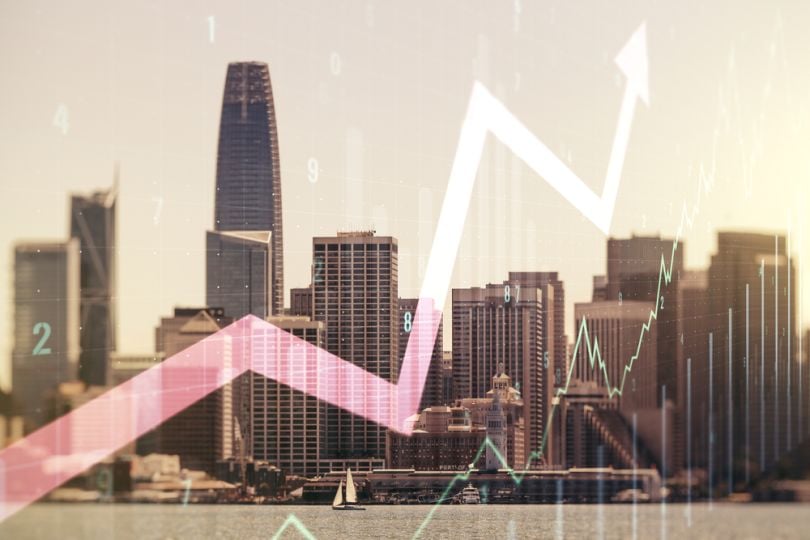 upwards growth lines overlaying the San Francisco skyline