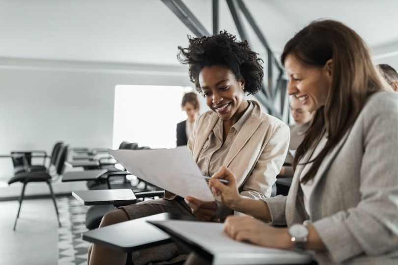 Two women working together