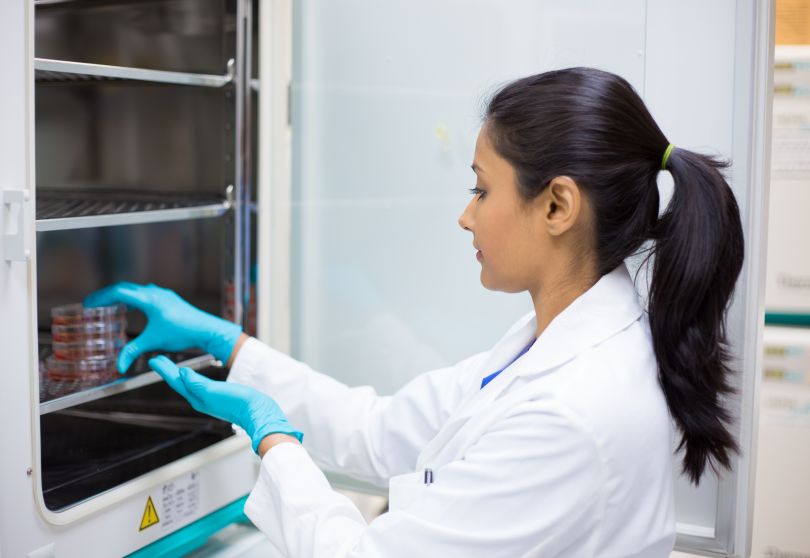A clinician removing samples from storage