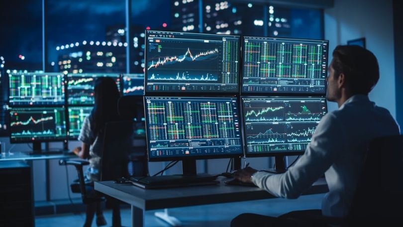 Finance professionals track real-time market data.&nbsp;
