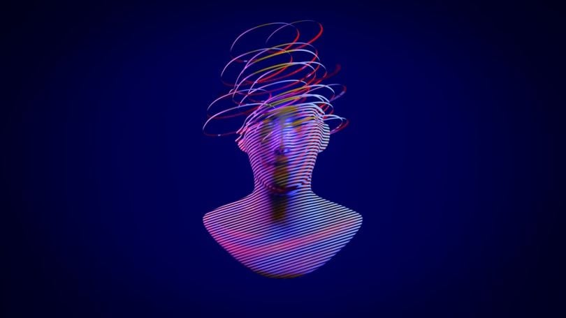 An image of a human face with colorful spirals coming out of the top of the head.