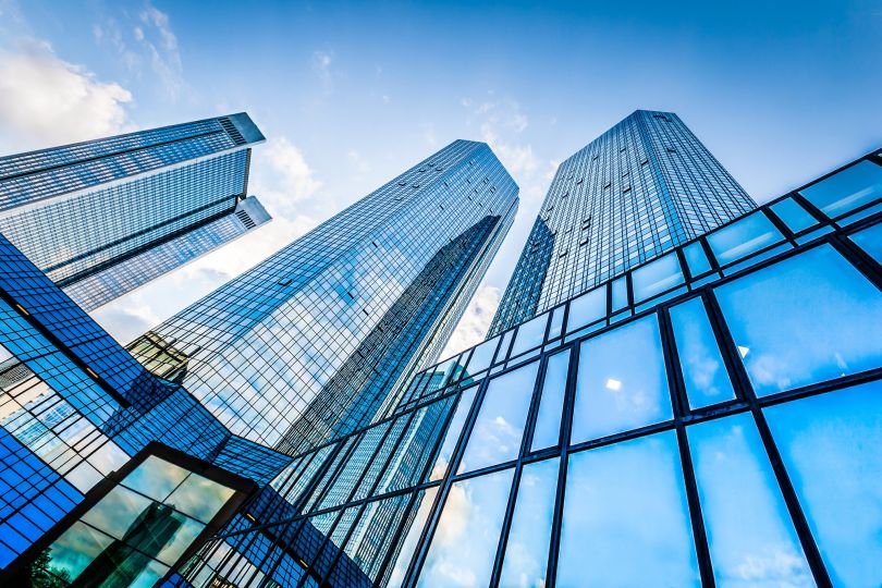 A ground-level shot of high-rise buildings