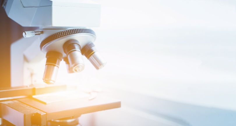 A close up shot of a microscope is pictured.