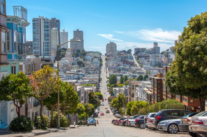 Buildings line rolling hills in San Francisco.